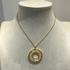 Gold toned necklace with clear crystals